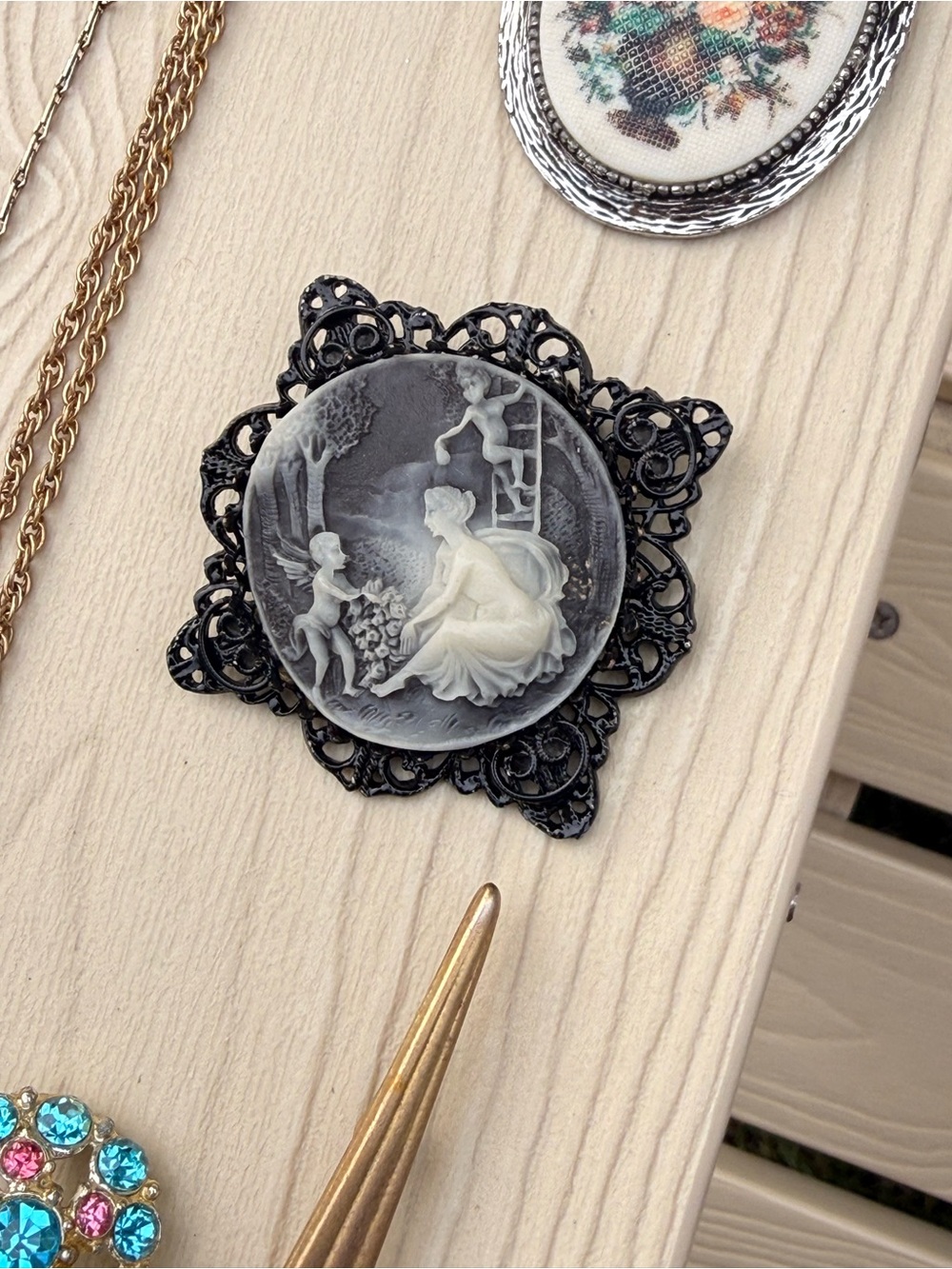 Vintage-Style Black Cameo Brooch with Ivory Relief